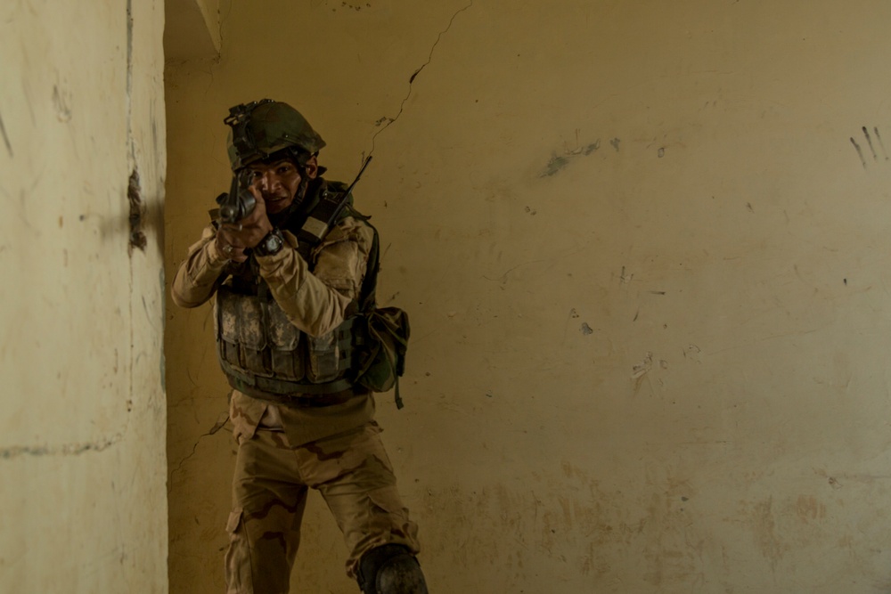 Iraqi soldiers take part in mortar, urban operations training at Camp Taji, Iraq