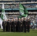 Sailors assigned to Navy Recruiting District New York stand in formation at MetLife Stadium during a Veterans Day military appreciation game