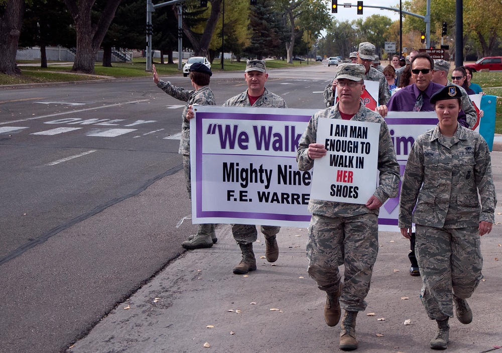 Walk, rally brings awareness of domestic violence to base