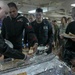 Sailors onboard USS New York (LPD 21) enjoy hoagies delivered by the Navy League NYC