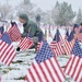 Airmen place flags, honor Veterans Day