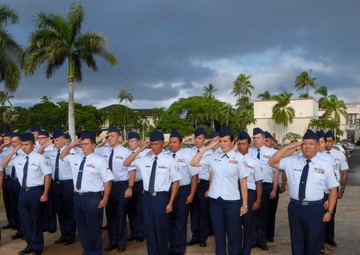 154th Com Flight performs reveille ceremony