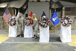 Current Soldiers take a moment to honor those who came before
