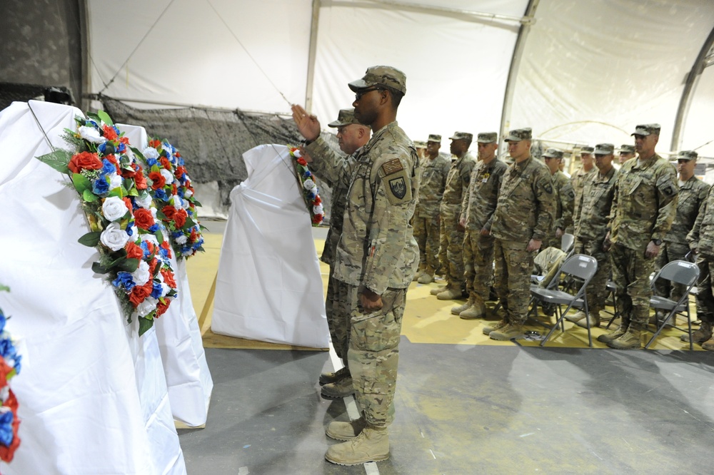 Current Soldiers take a moment to honor those who came before