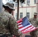Sailors serving in Afghanistan commemorate Veterans Day with flag raising