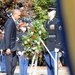 President Obama steps back from laying a wreath at 62nd annual national Veterans Day observance at Arlington National Cemetery