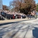 Secretary of defense looks on as President Barack Obama enters at the 62nd annual national Veterans Day observance at Arlington National Cemetery