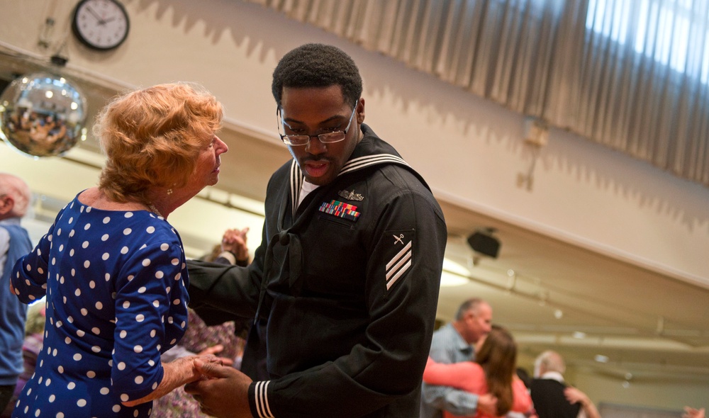 Naval Station Everett Sailors dance with veterans