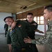 Coastal Riverine Group ONE Detachment Guam Sailors demonstrate mechanical advantage control hold takedown and handcuffing techniques to Royal Cambodia sailors and military police