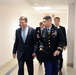 Secretary of defense walks and talks with retired Army Capt. Florent Groberg on the way to the Medal of Honor Hall of Heroes induction ceremony