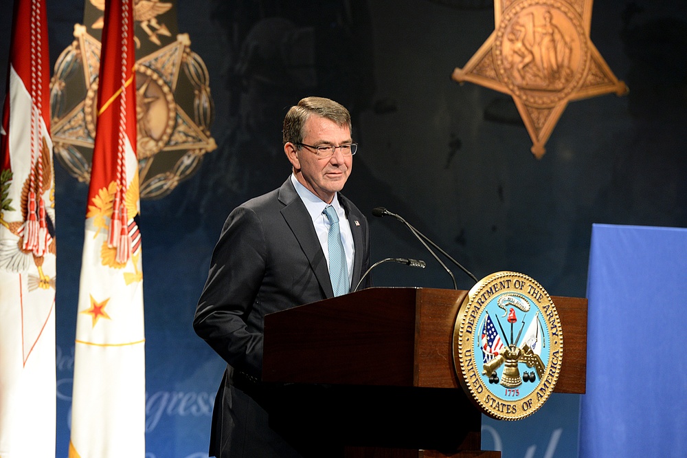 Secretary of defense speaks during the Medal of Honor Hall of Heroes induction ceremony for retired Army Capt. Florent Groberg