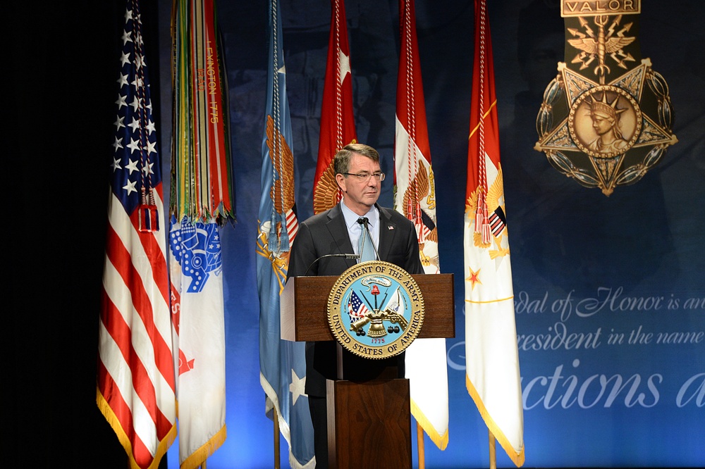 Secretary of defense speaks during the Medal of Honor Hall of Heroes induction ceremony for retired Army Capt. Florent Groberg