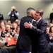 Secretary of defense shares an embrace with retired Army Capt. Florent Groberg after he spoke at the Medal of Honor Hall of Heroes induction ceremony