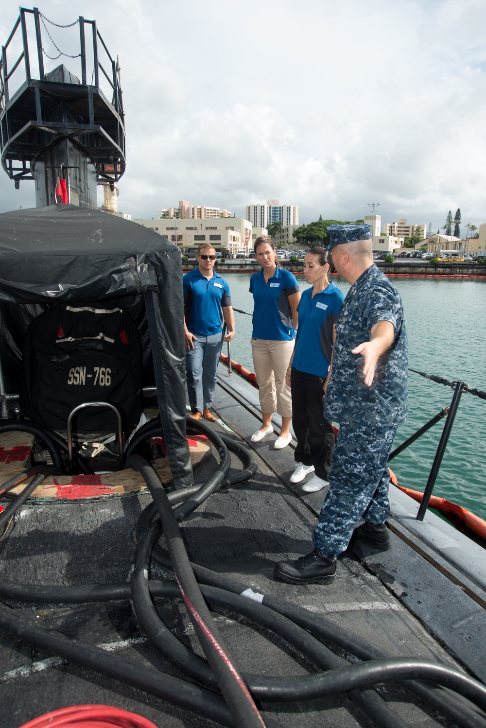 Members of FOCUS Project Hawaii receive a tour aboard USS Charlotte