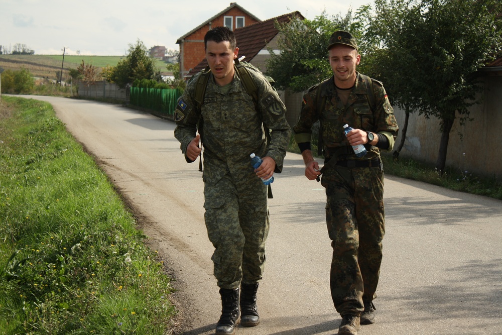 Nearly 1,000 multinational Soldiers complete DANCON march in Kosovo