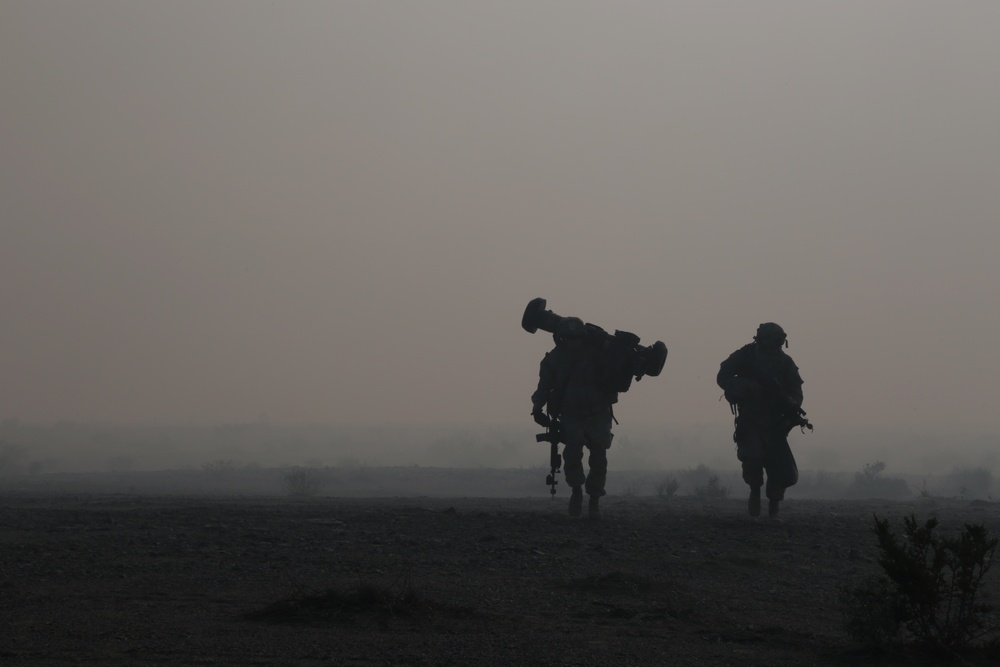 4th Infantry Division Soldiers assault under smokescreen