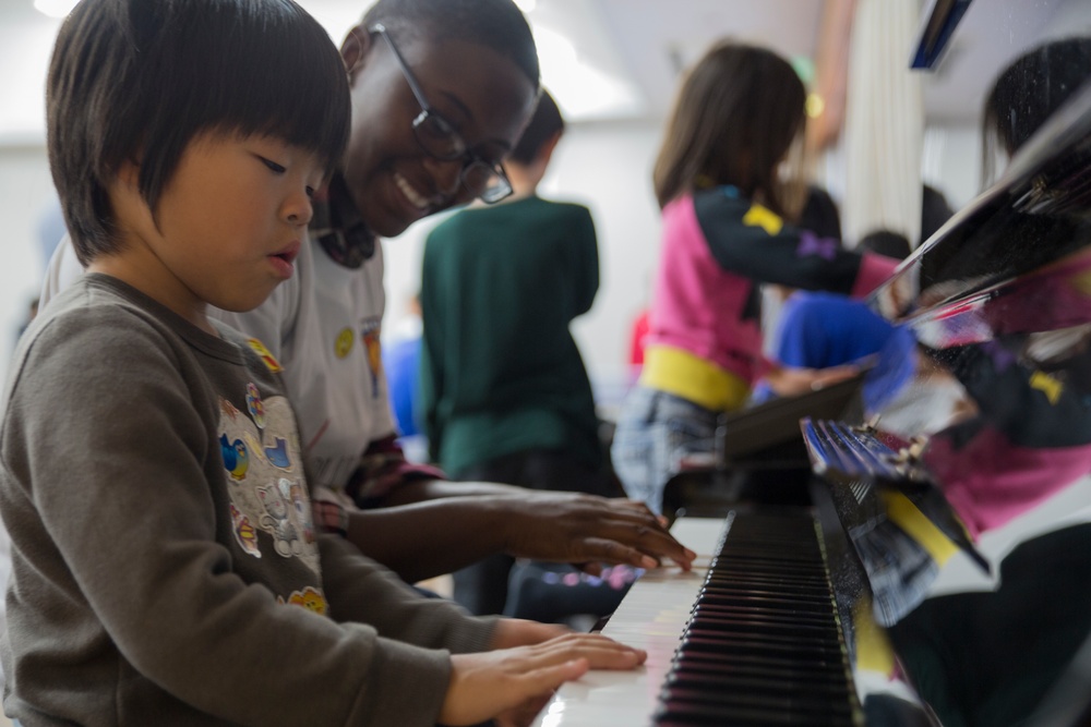 Japanese orphans’ day brightened by station volunteers