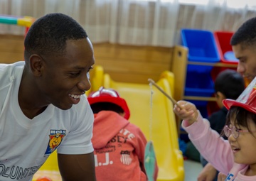 Japanese orphans’ day brightened by station volunteers