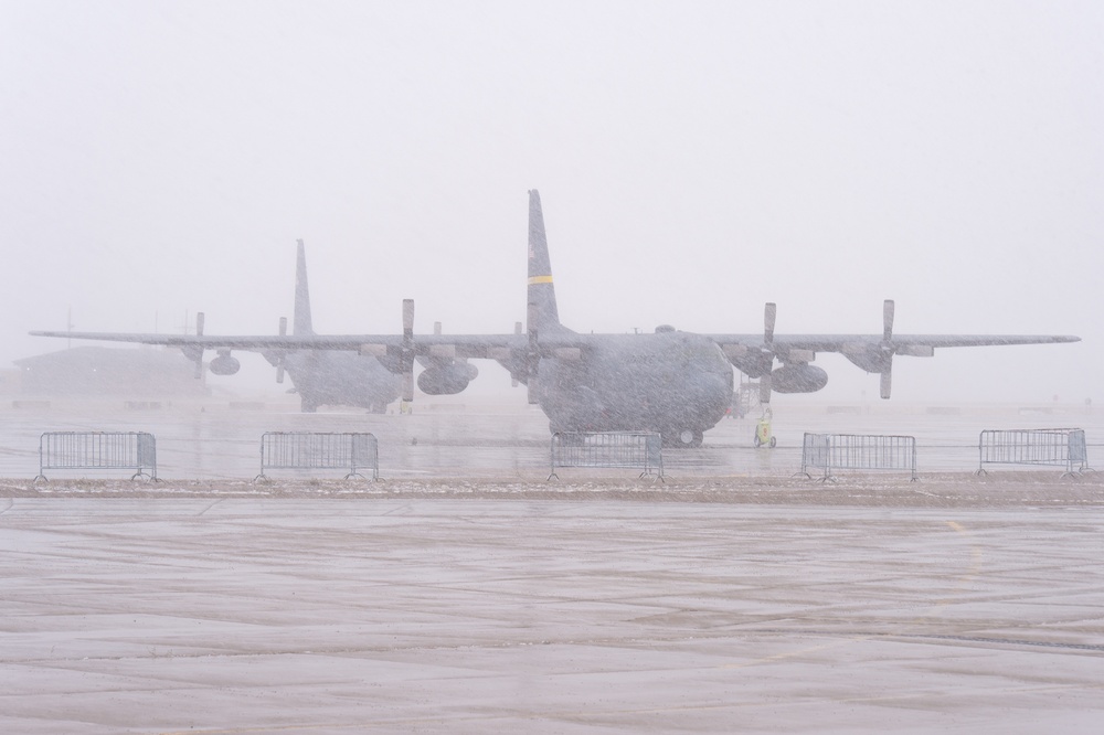 Snow blankets C-130s in Wyoming
