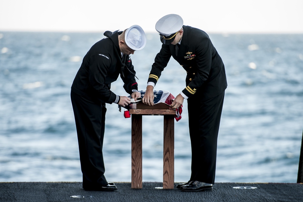 USS Harry S. Truman Sailors participate in burial at sea ceremony