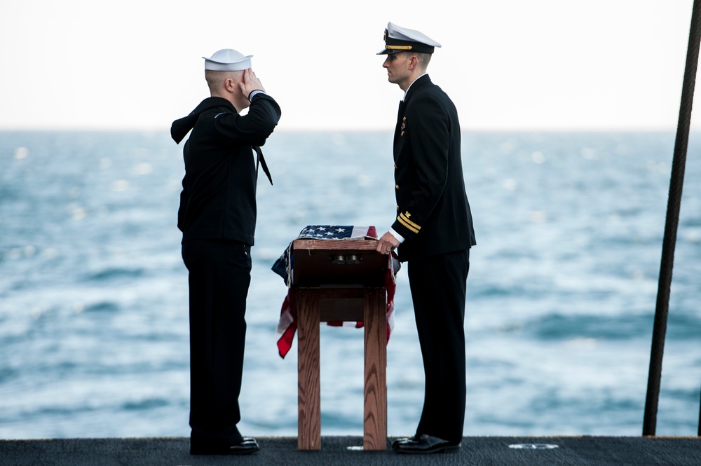 USS Harry S. Truman Sailors participate in burial at sea ceremony