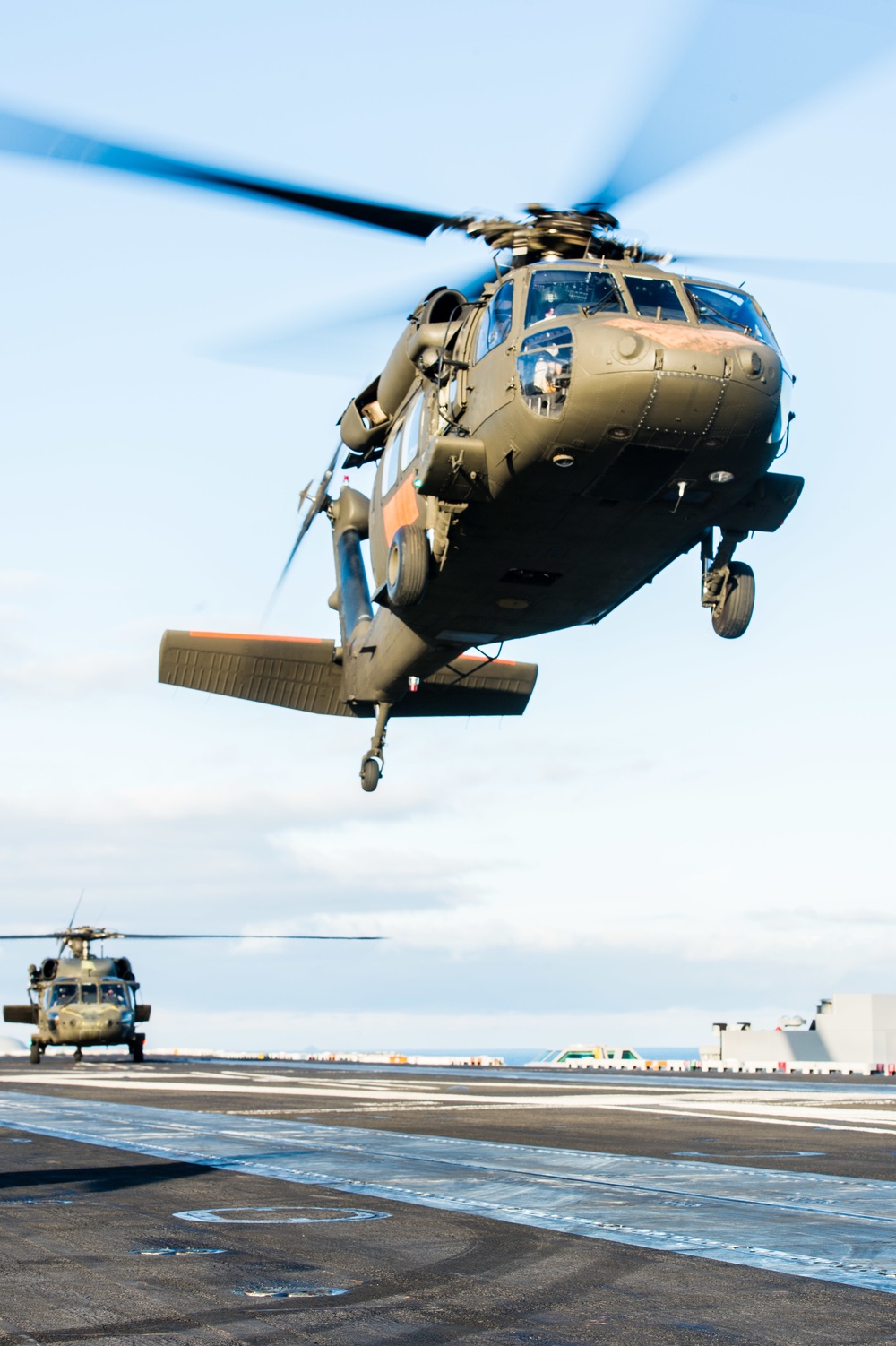 Washington Army National Guard Black Hawks land, take off on USS John C. Stennis
