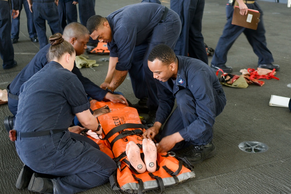 USS Dwight D. Eisenhower Sailors conduct stretcher bearer training