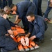 USS Dwight D. Eisenhower Sailors conduct stretcher bearer training