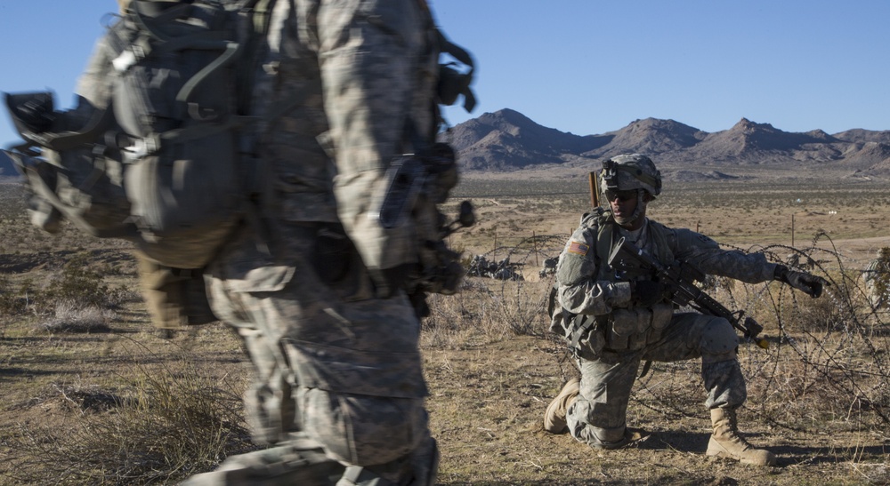 Soldiers assault an enemy stronghold in California