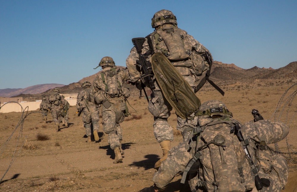 Soldiers assault an enemy stronghold in California