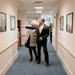 Secretary of defense shows Netherland's MoD Jeanine Hennis-Plaaschaert photos from some of his pervious trips this year