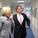 Secretary of defense shows Netherland's MoD Jeanine Hennis-Plaaschaert photos from some of his pervious trips this year