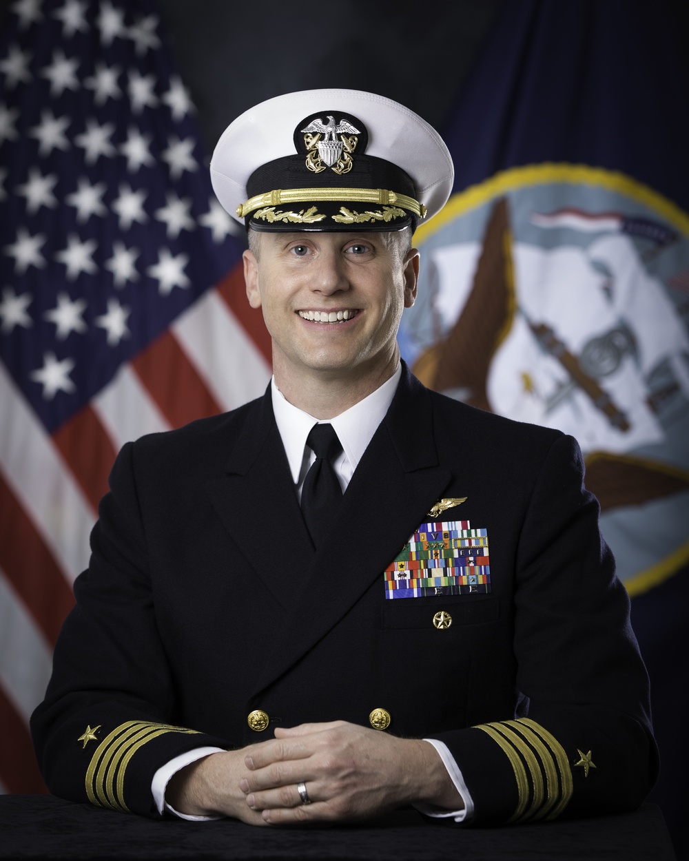 Official portrait of Commander, Fleet Activities Okinawa, Capt. Robert W. Mathewson, US Navy