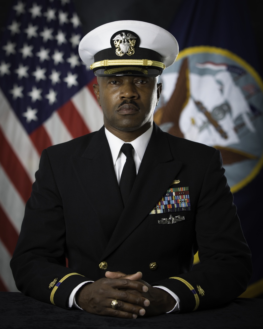 Official portrait, Command Information Officer, Field Support Activity, Chief Warrant Officer Norman W. Dixson, US Navy