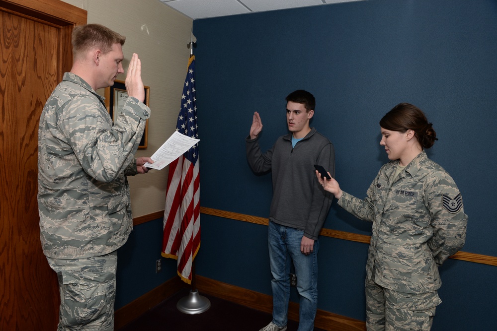 Brother administers oath of enlistment