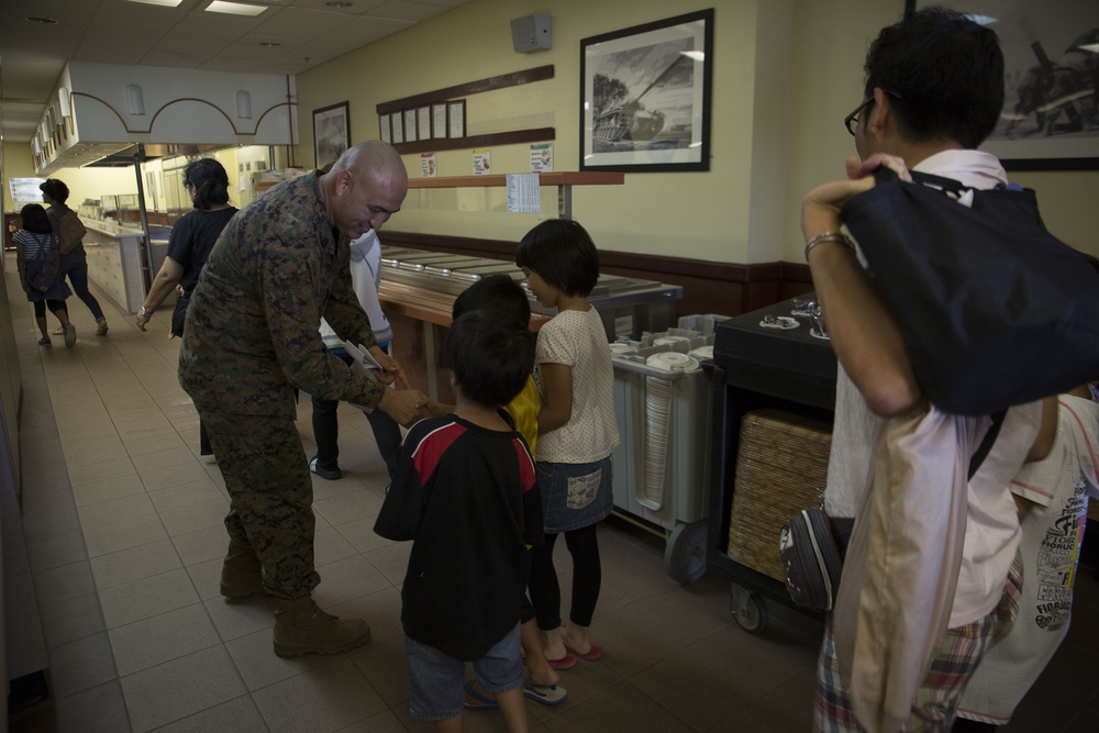 Okinawa residents tour chow hall, flight line on MCAS Futenma