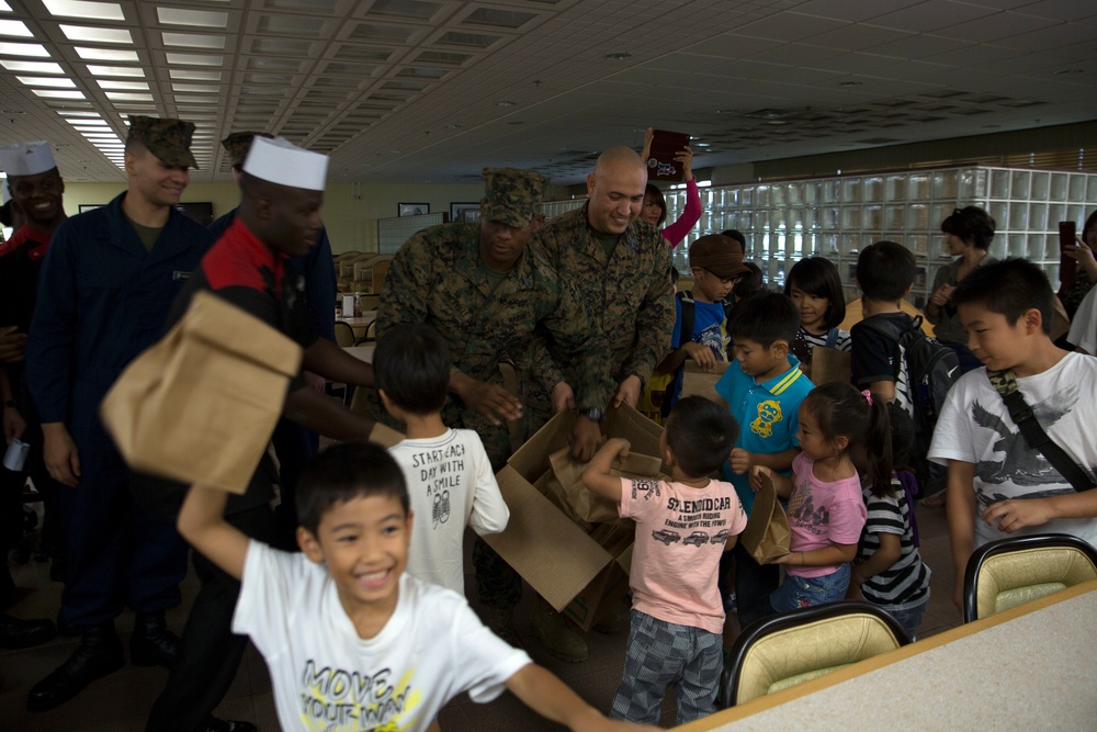 Okinawa residents tour chow hall, flight line on MCAS Futenma