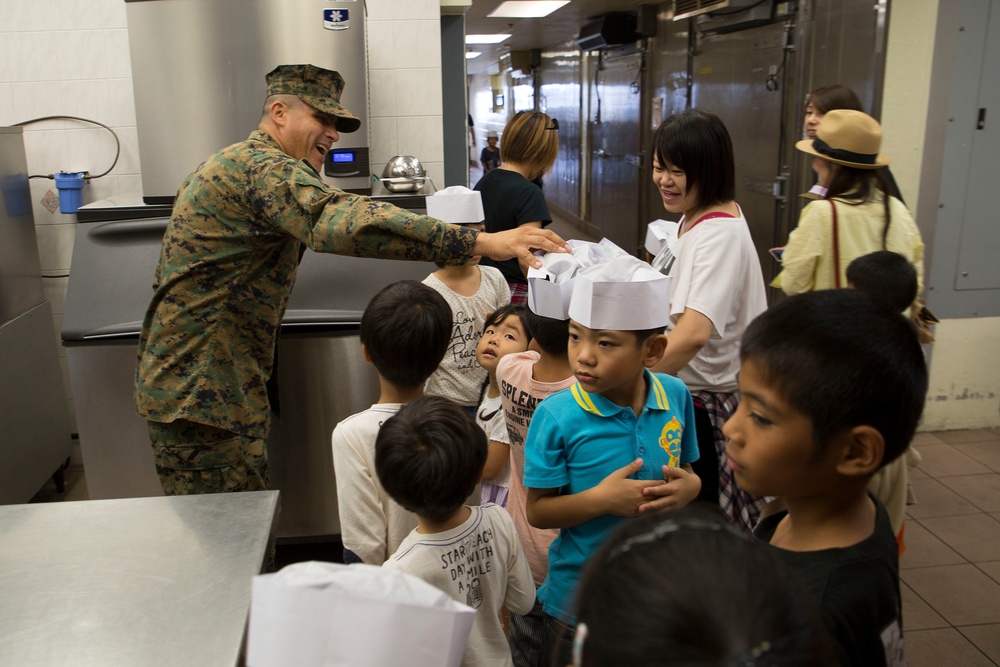 Okinawa residents tour chow hall, flight line on MCAS Futenma