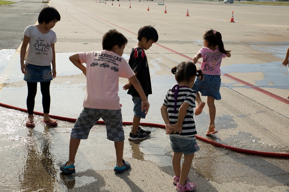 Okinawa residents tour chow hall, flight line on MCAS Futenma