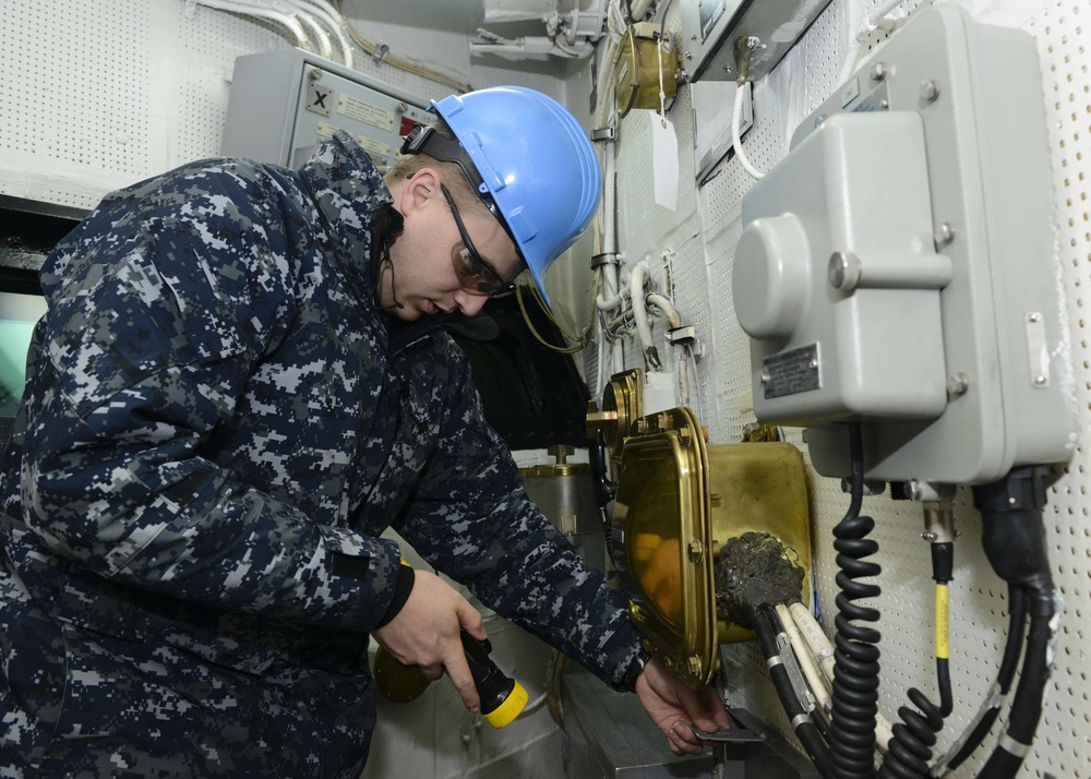 Nimitz Sailor inspects conflag station