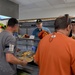 DSD and his wife serve Thanksgiving lunch to members of Camp Lemonnier, Djibouti