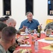 DSD speaks with service members in Al Udeid, Qatar at a Thanksgiving meal