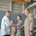 Deputy secretary of defense coining military members