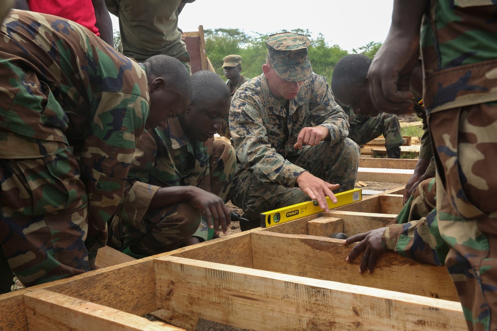 Built to last: U.S. Marines and Ugandan soldiers fortify engineering skills