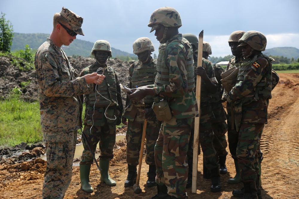 Breaching the barrier: Ugandans, US Marines blow through obstacles