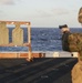 U.S. Marines sight in on targets