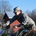 National Guard troops lend a hand in loading Trees for Troops