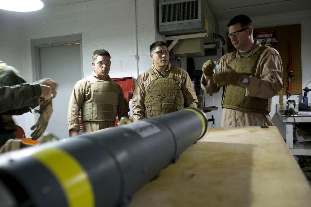 Steady hands: EOD technicians disarm Griffin missile