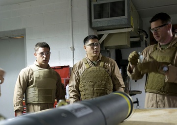Steady hands: EOD technicians disarm Griffin missile