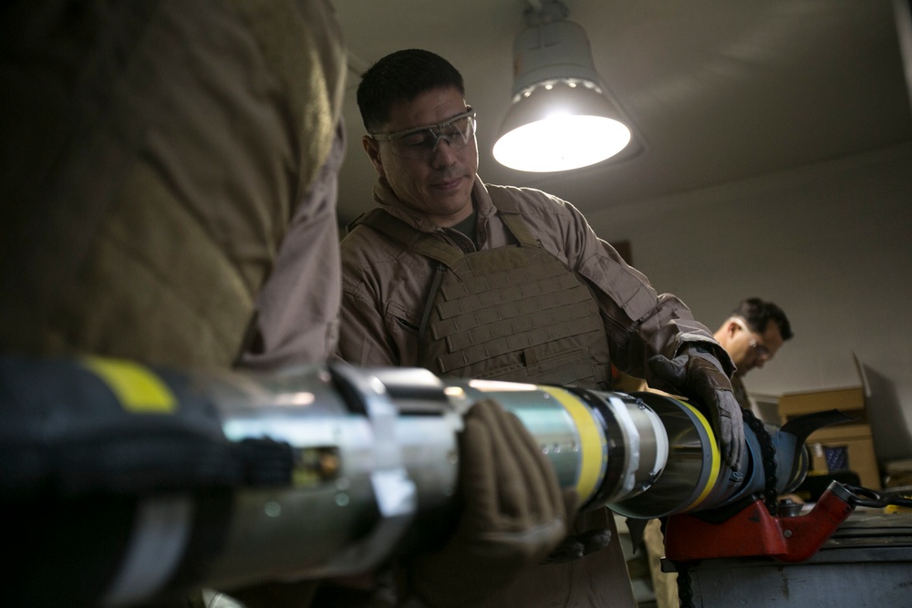 Steady hands: EOD technicians disarm Griffin missile